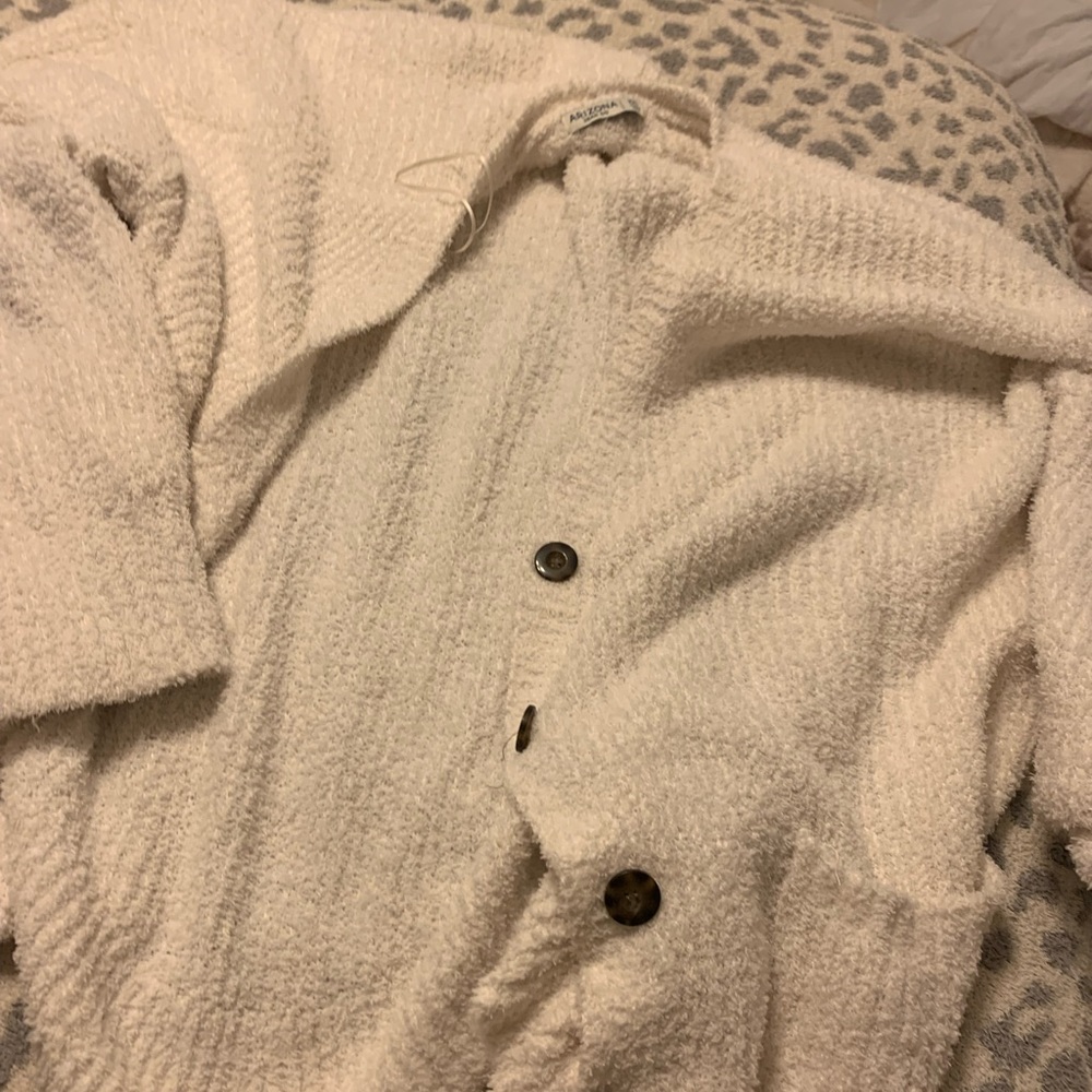 cream colored cardigan